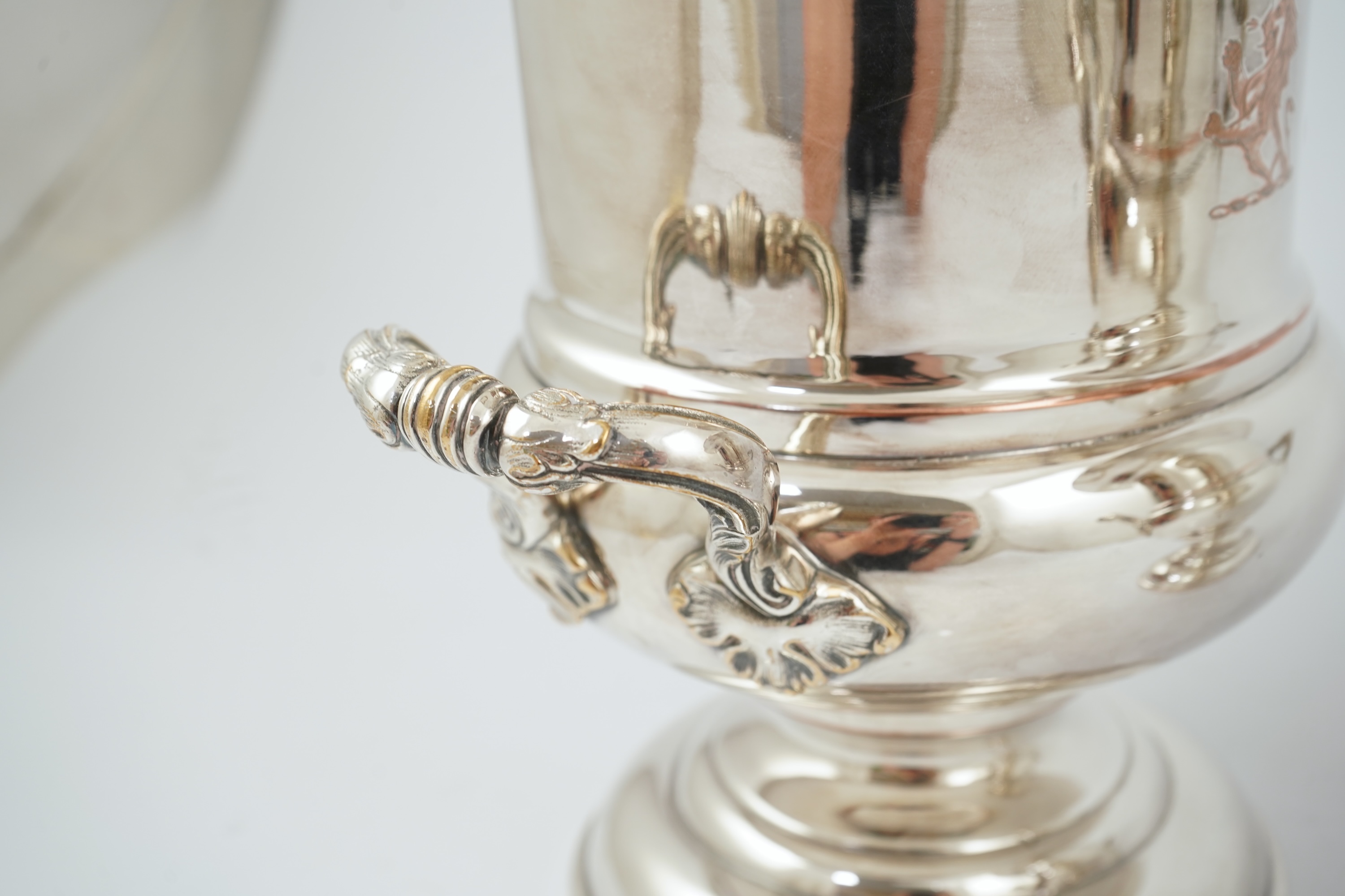 A pair of late 19th/early 20th century silver plated two handled campana shaped wine coolers, makers, FH